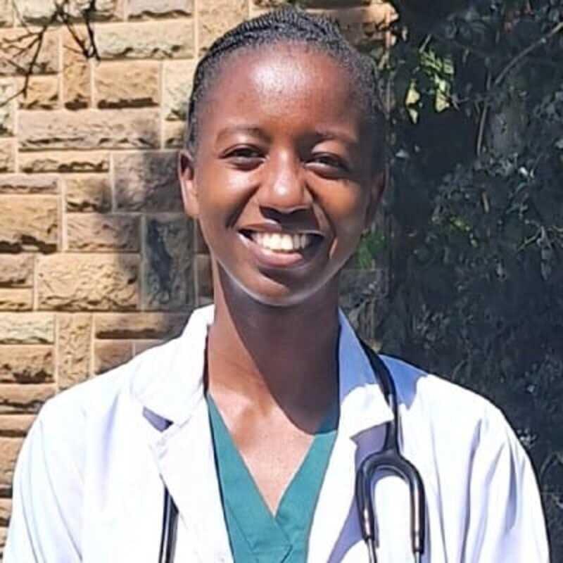 Dr. Glory Mbone